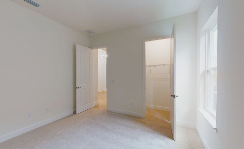 Spacious, unfurnished interior of a new home in Woodhaven, Port Orange (Image 29).