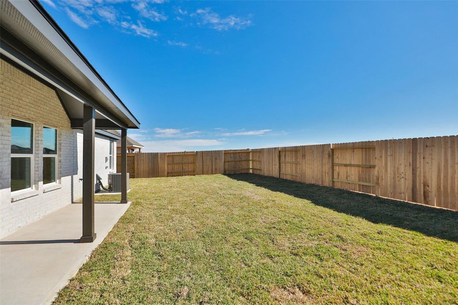 Exterior details and patio area of a home in River Ranch, Dayton (Image 19).