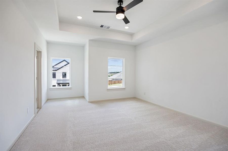 This peaceful owner's retreat features high ceilings, plush carpeting and wonderful natural light!