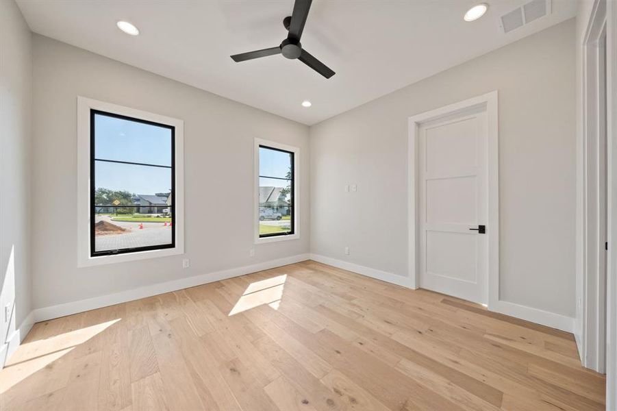 2nd bedroom toward the front of the home. Each secondary bedroom has it's own ensuite!