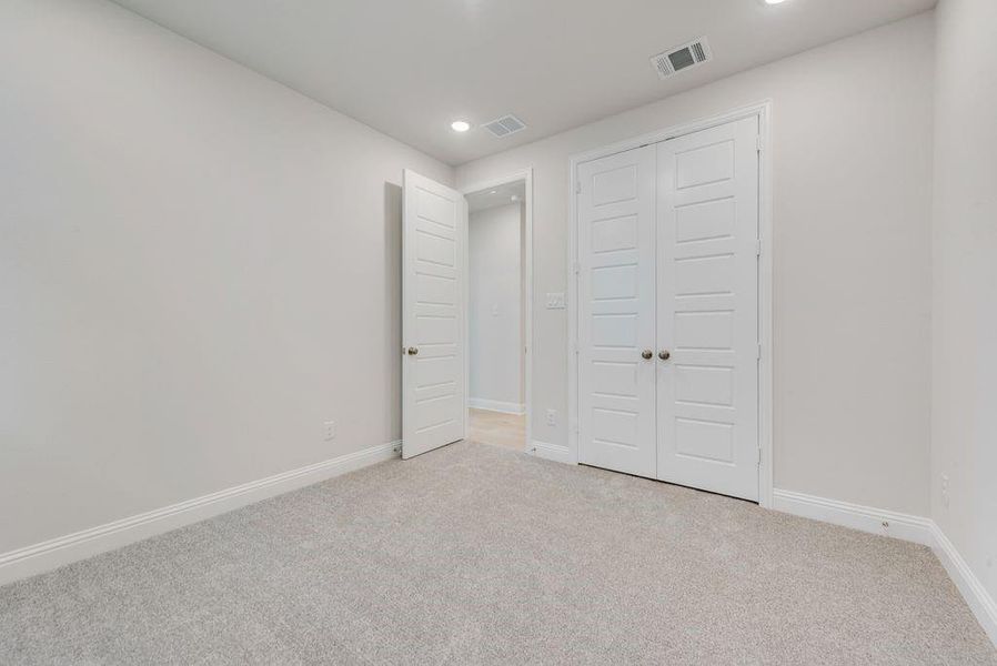 Spacious, unfurnished interior of a new home in Valencia On The Lake, Little Elm (Image 30).