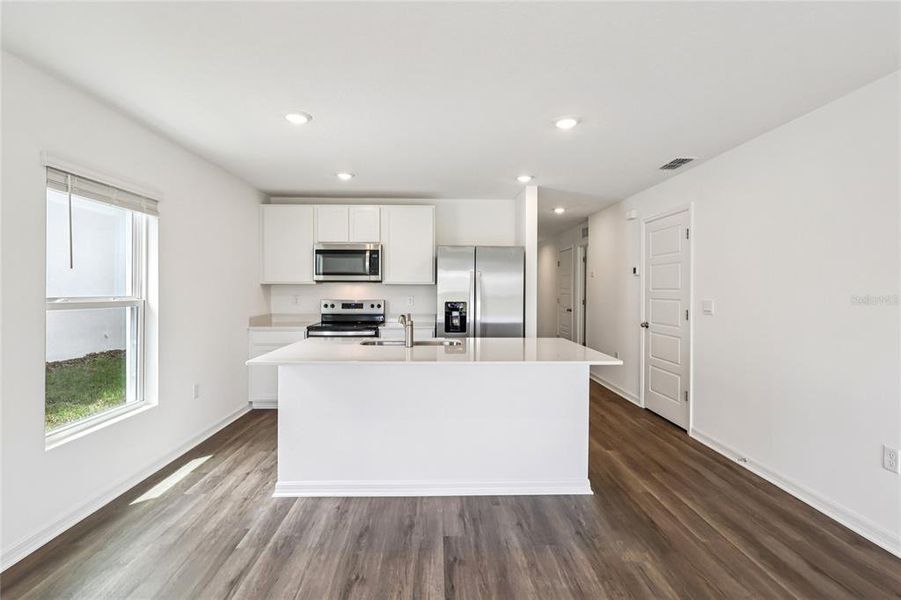 Furnished interior view inside a new home in Leoma's Landing, Lake Wales (Image 5).