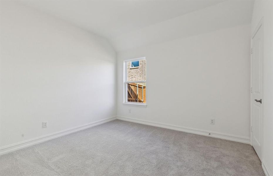 Spacious secondary bedroom with ample closet space *real home pictured