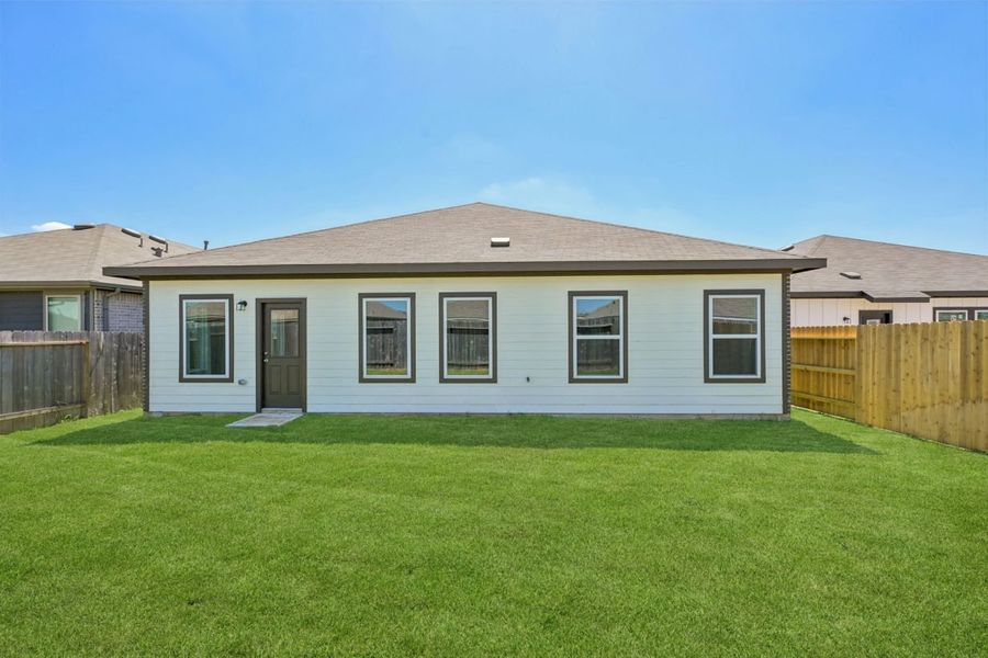 Exterior details and patio area of a home in Harrington Trails, New Caney (Image 4).