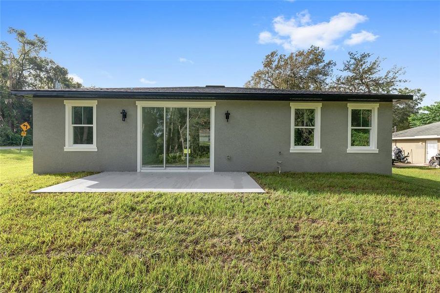 Exterior details and patio area of a home in , Ocala (Image 4).