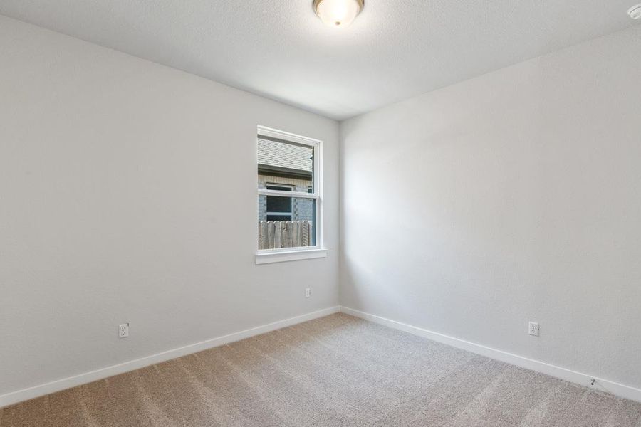 Spacious, unfurnished interior of a new home in Lariat, Liberty Hill (Image 34).