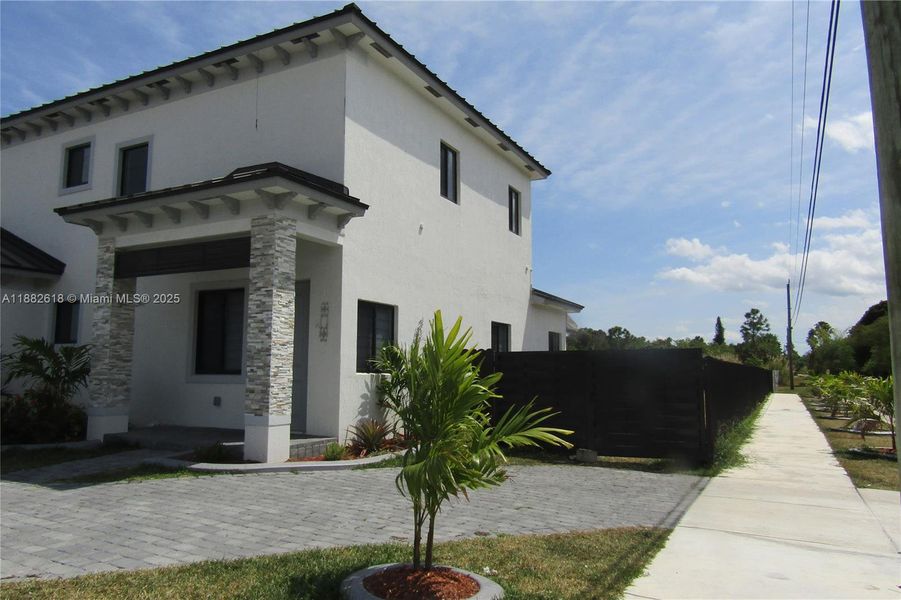 Front exterior of a new home in , Miami, FL, highlighting curb appeal (Image 19). Front exterior of a new home in , Miami, FL, highlighting curb appeal (Image 19).
