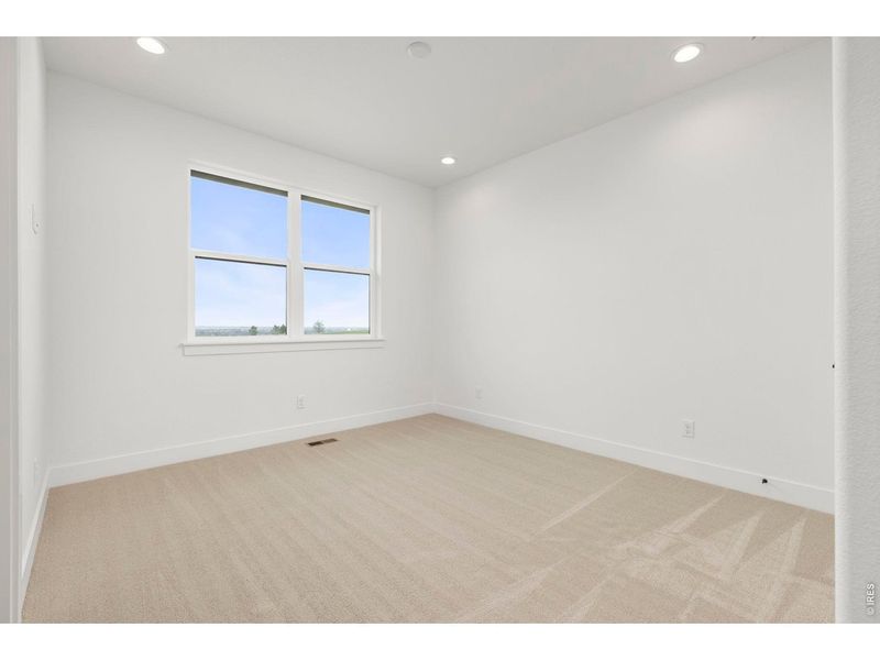 Spacious, unfurnished interior of a new home in RainDance, Windsor (Image 22).