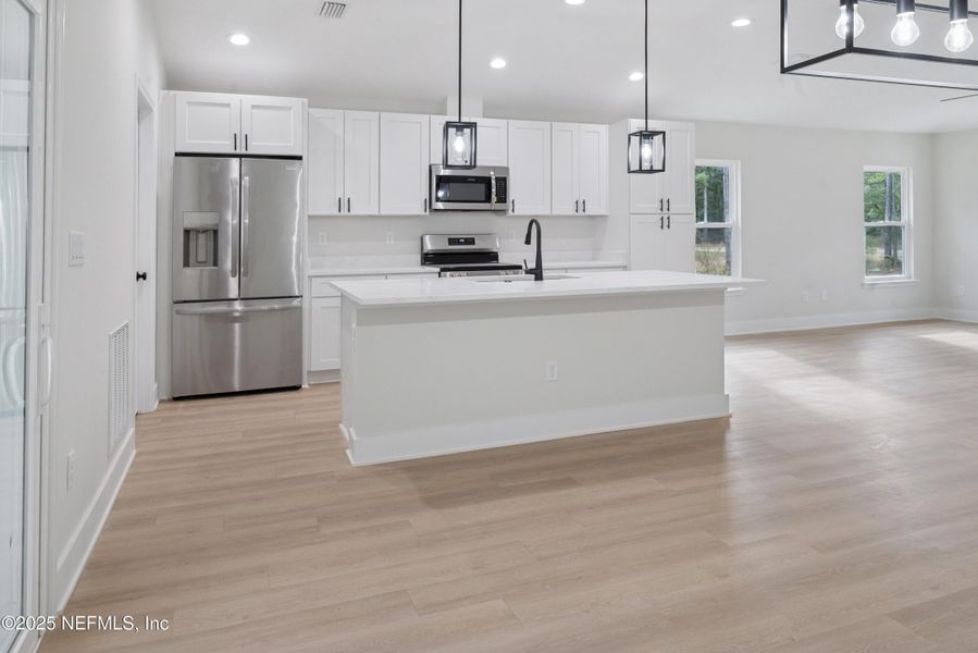 Furnished interior view inside a new home in , Florahome (Image 5).