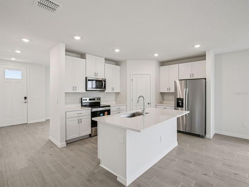 Furnished interior view inside a new home in Oakfield Trails - Classic Series, Parrish (Image 8).