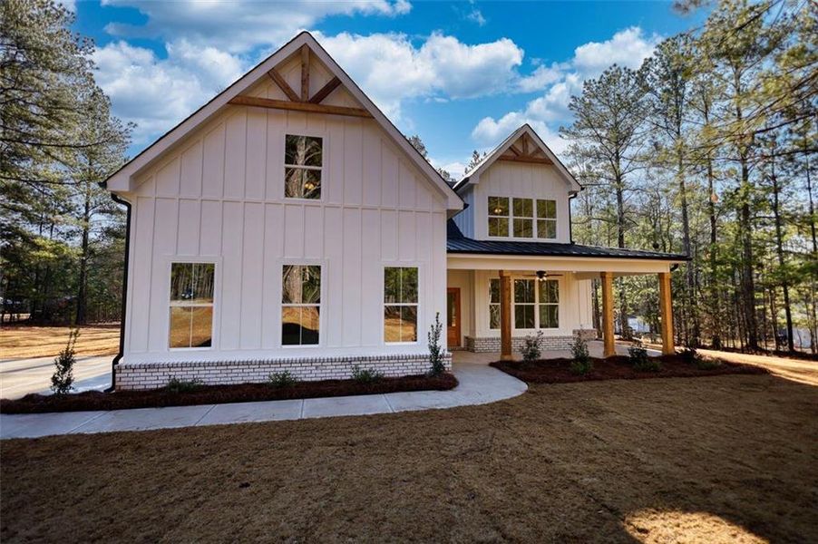 Front exterior of a new home in , Mansfield, GA, highlighting curb appeal (Image 2). Front exterior of a new home in , Mansfield, GA, highlighting curb appeal (Image 2).