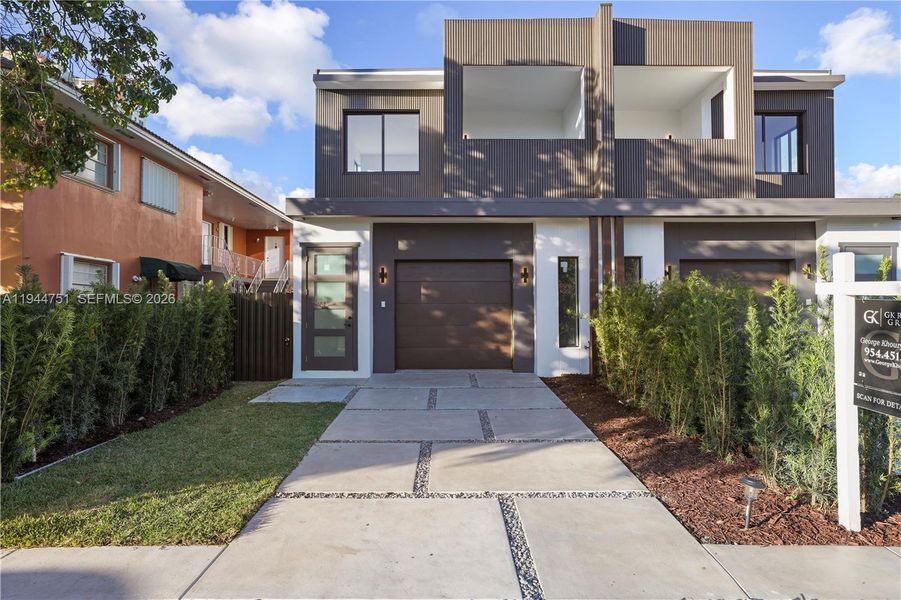 Front exterior of a new home in , Miami, FL, highlighting curb appeal (Image 19).
