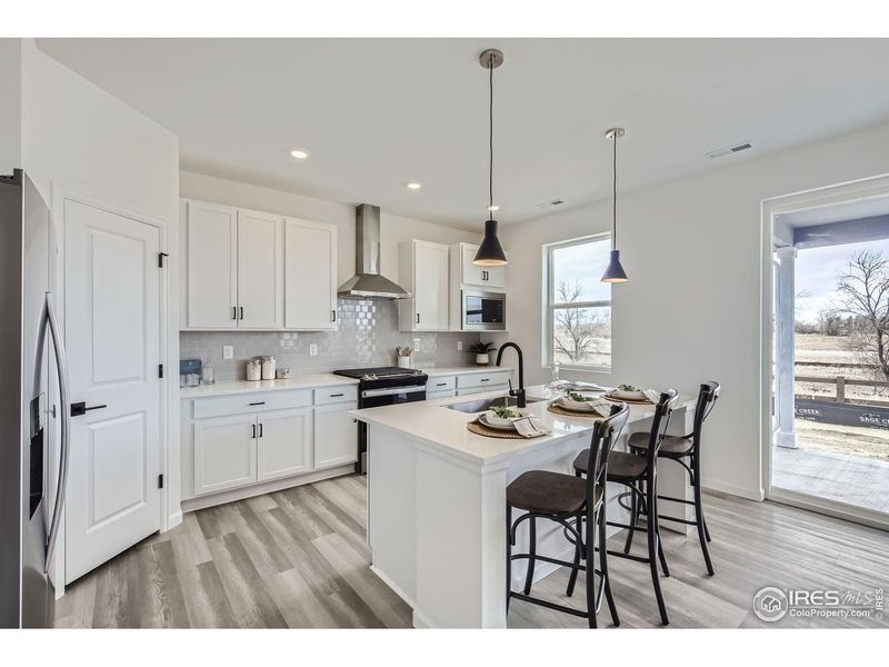 Furnished interior view inside a new home in Farmstead, Berthoud (Image 15). Furnished interior view inside a new home in Farmstead, Berthoud (Image 15).