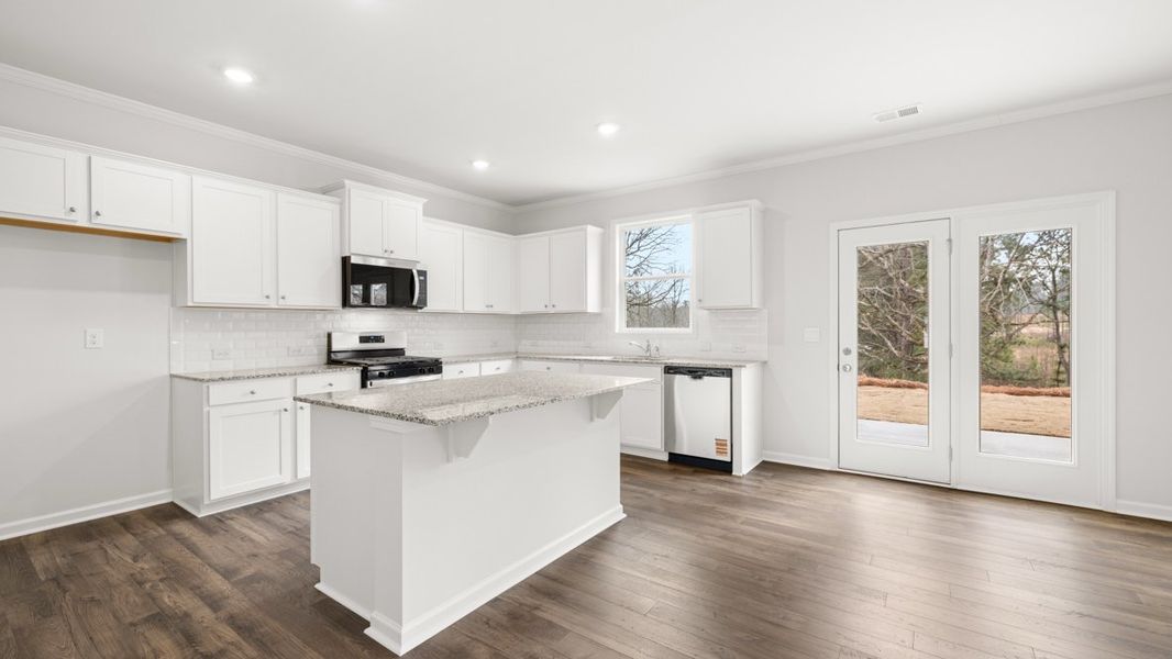 Representative furnished interior of a home built from the Hanover by D.R. Horton in Thompson Ridge, Dallas (Image 5).