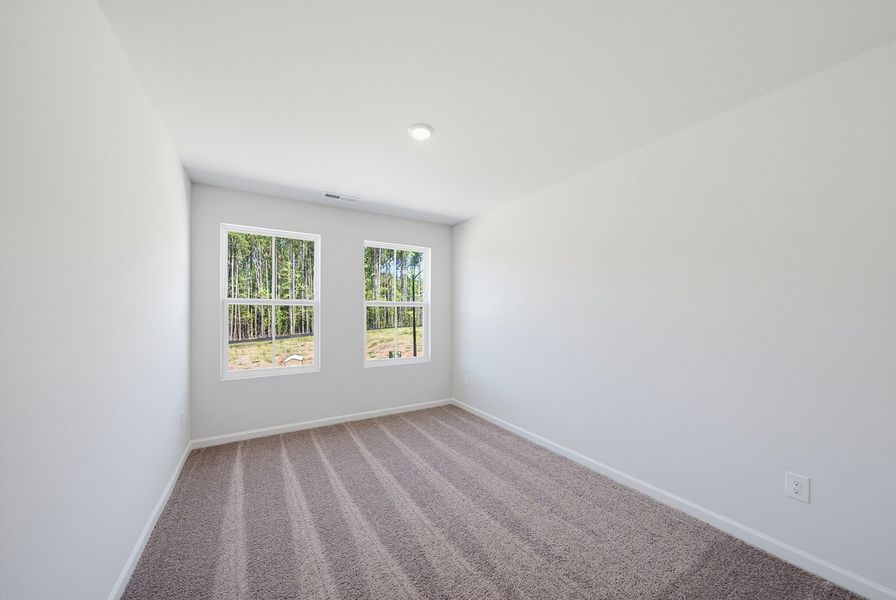 Spacious, unfurnished interior of a new home in Sweetbrier, Durham (Image 22).