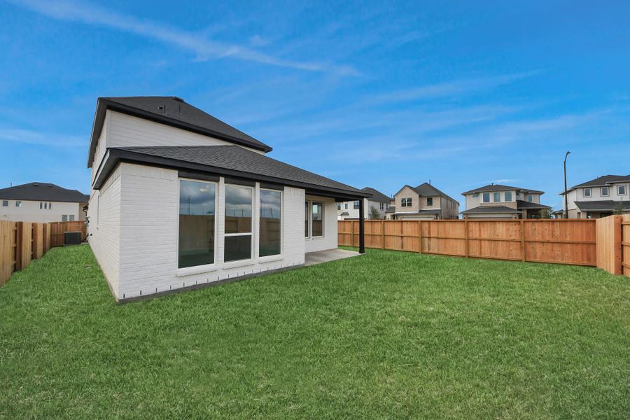 Exterior details and patio area of a home in Elyson, Katy (Image 3).