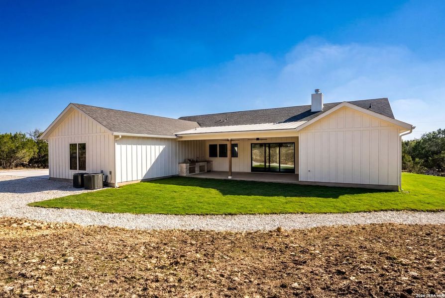Exterior details and patio area of a home in , Boerne (Image 26).