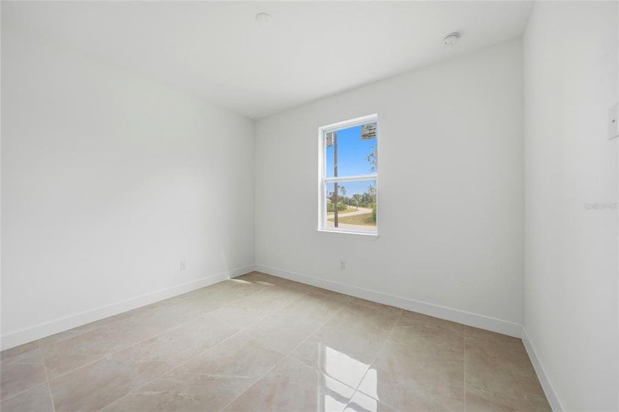 Spacious, unfurnished interior of a new home in , Port Charlotte (Image 40).