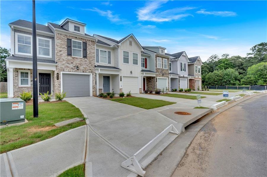 Exterior details and patio area of a home in Village Green, Adairsville (Image 28).