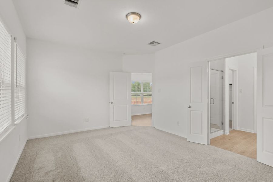 Representative unfurnished interior of a home built from the Chalet by Chesmar Homes in Woodforest, Montgomery (Image 8).