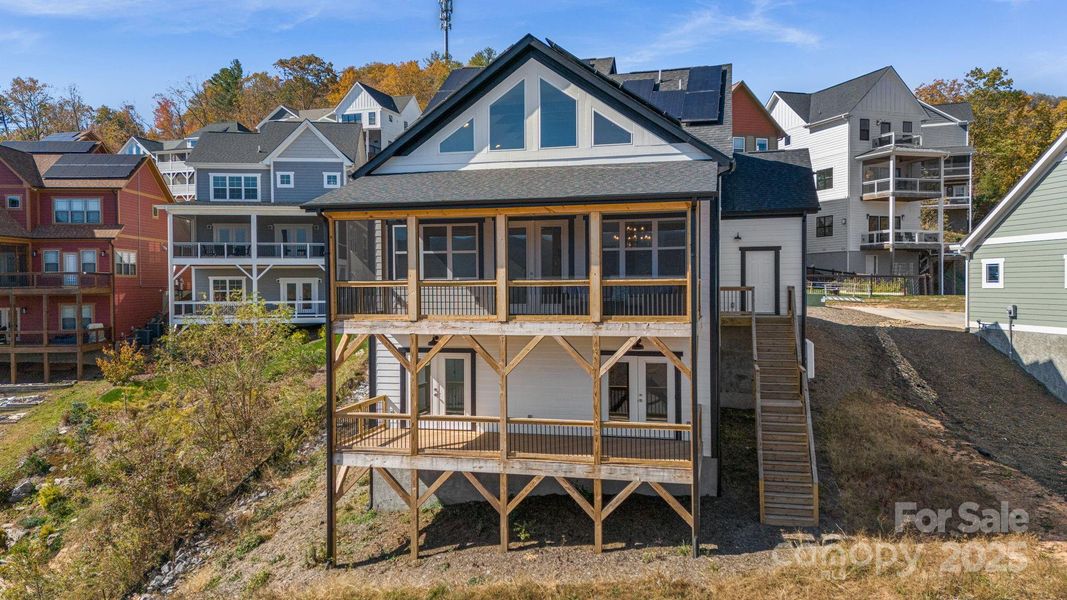 Exterior details and patio area of a home in , Black Mountain (Image 24).