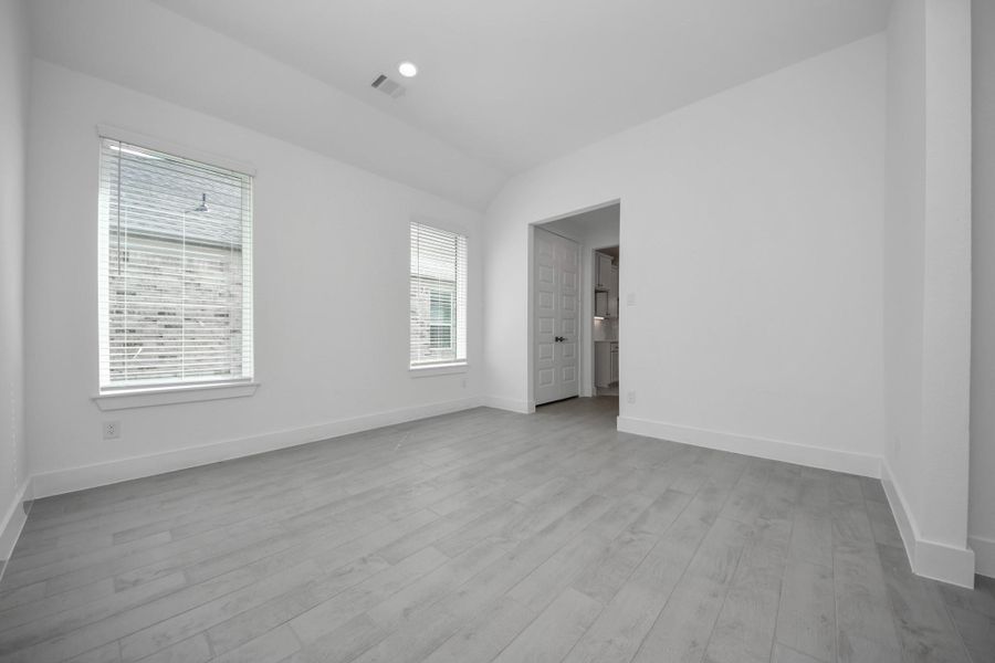 Make memories gathered around the table with your family and friends! This spacious dining room features elegant flooring, custom paint, and adjacent to family room and kitchen for open concept feel.