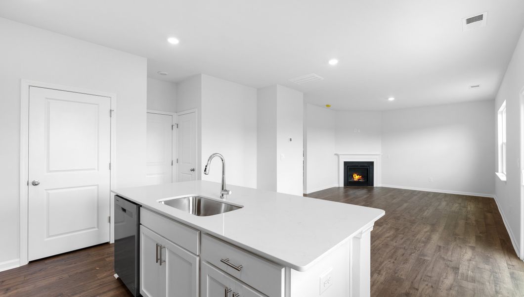 Representative furnished interior of a home built from the BELHAVEN by D.R. Horton in Benjamin's Grove, Woodruff (Image 11).