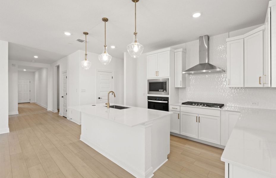 Representative furnished interior of a home built from the Orchard by Pulte Homes in Saddleback at Santa Rita Ranch, Liberty Hill (Image 6).