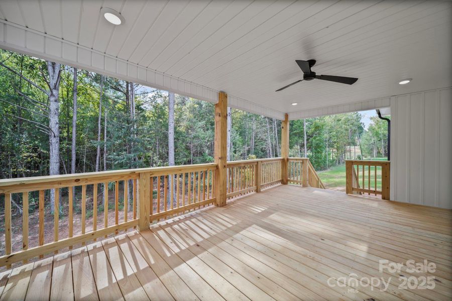 Large covered patio with recessed lighting and ceiling fans. Large covered patio with recessed lighting and ceiling fans.
