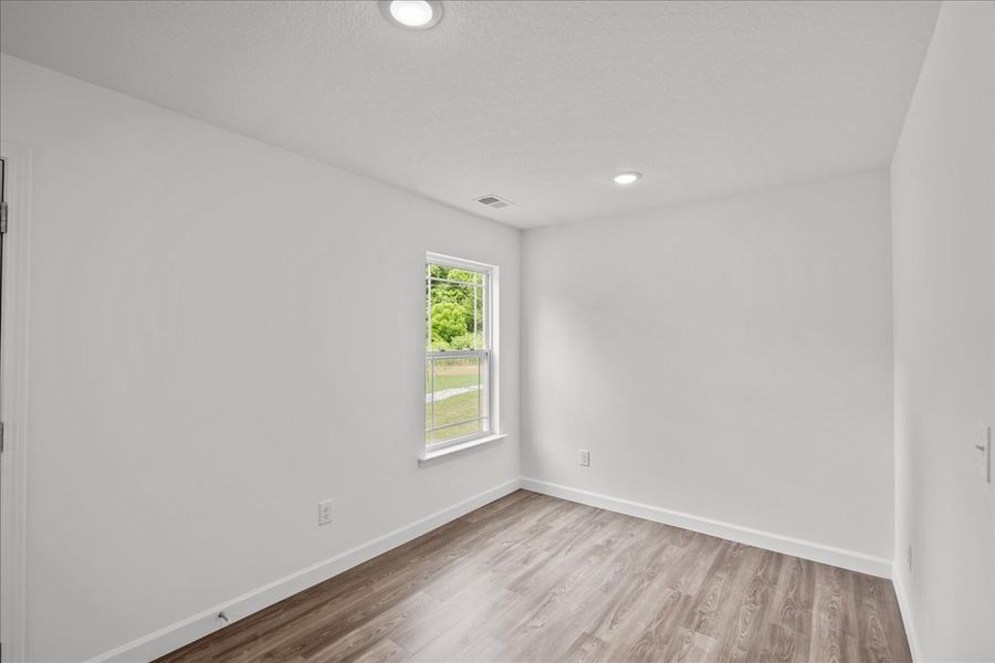 Representative unfurnished interior of a home built from the Lexington by Enchanted Homes in Gentry Place, Spartanburg (Image 21).