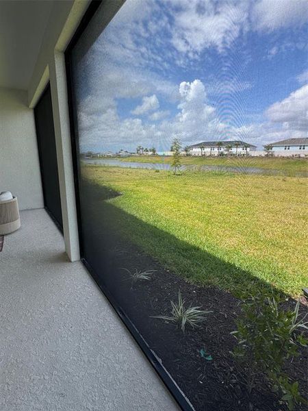 Exterior details and patio area of a home in Esplanade at Azario Lakewood Ranch, Bradenton (Image 4).