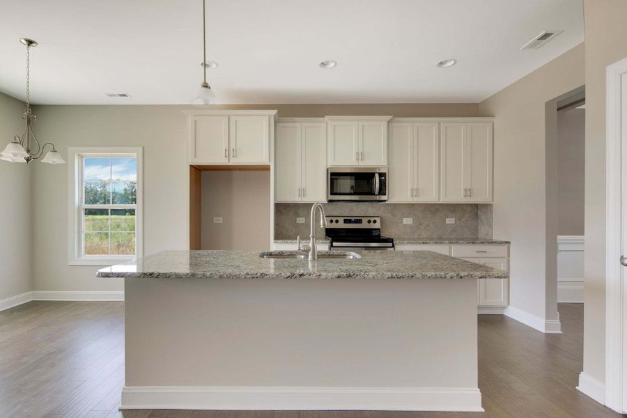 Representative furnished interior of a home built from the Clayton by Caviness & Cates Communities in Bartlett Manor, Youngsville (Image 167).
