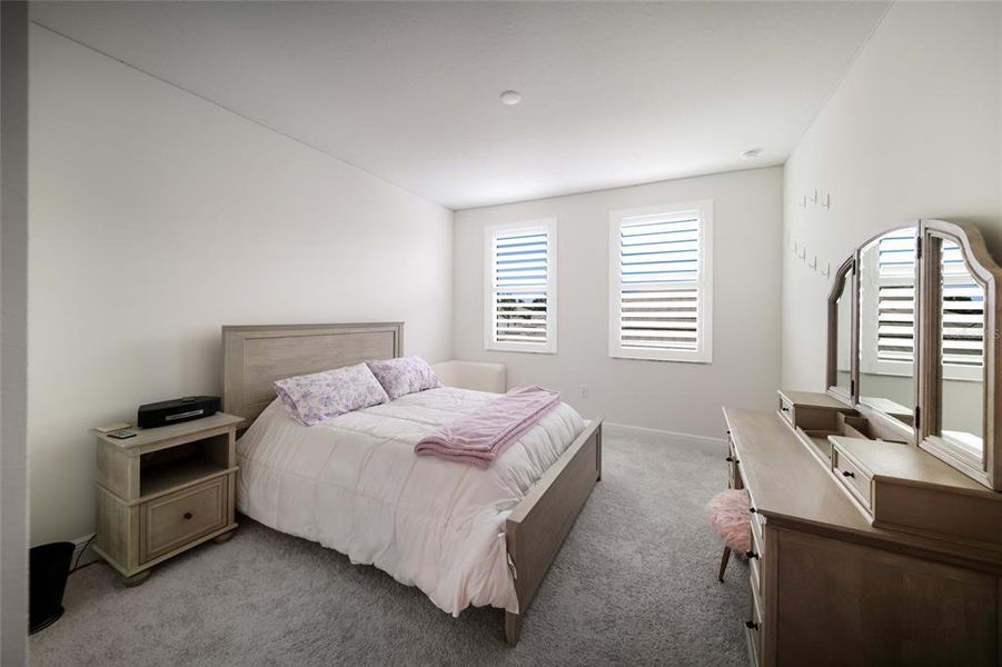Furnished interior view inside a new home in Sweetwater at Lakewood Ranch, Bradenton (Image 37).