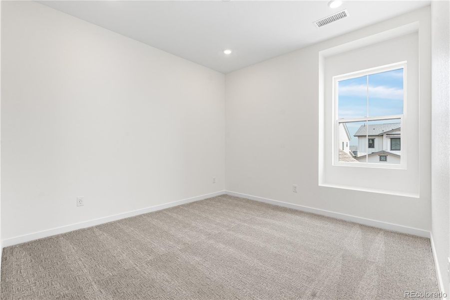 Spacious, unfurnished interior of a new home in Harmony at Solstice, Littleton (Image 24).