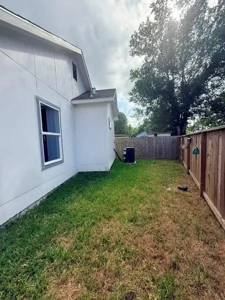 Exterior details and patio area of a home in , Baytown (Image 3).