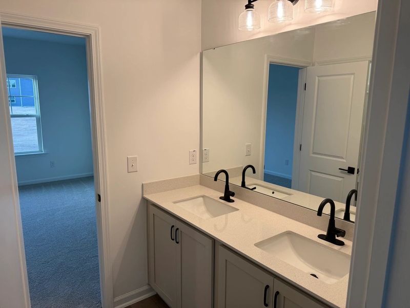 Primary Bath featuring the AW Collection® Artisan - A blend of artisan textures and calm, grounding colors. Primary Bath featuring the AW Collection® Artisan - A blend of artisan textures and calm, grounding colors.