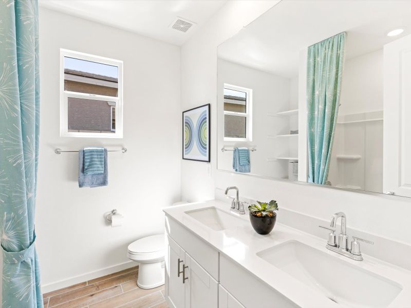 Furnished interior view inside a new home in Blossom Rock Reserve Series, Apache Junction (Image 6).