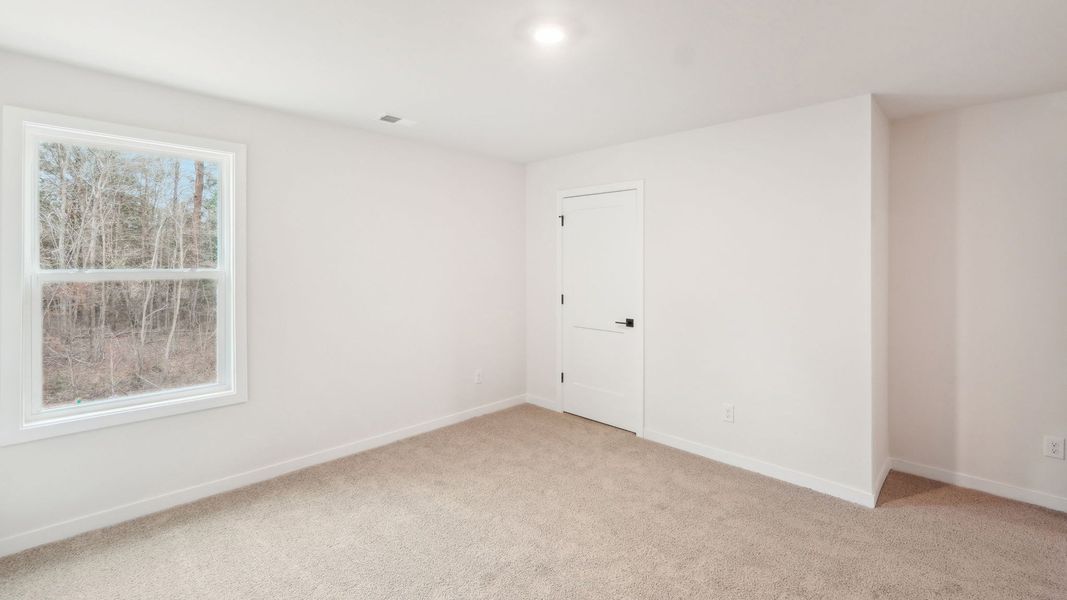 Spacious, unfurnished interior of a new home in Westport, York (Image 32).