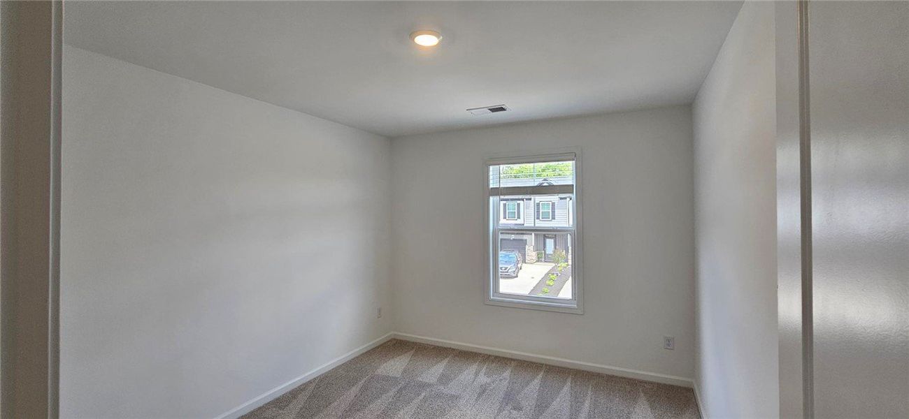 This bright and airy room offers a versatile space This bright and airy room offers a versatile space
