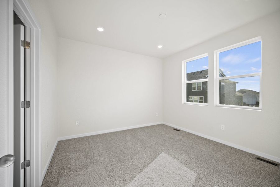 Representative unfurnished interior of a home built from the Juniper by View Homes in Aspen Ranch, Fountain (Image 25).
