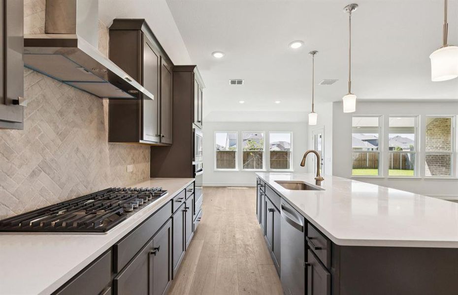 Gourmet kitchen designed for culinary excellence and entertaining *Real home pictured Gourmet kitchen designed for culinary excellence and entertaining *Real home pictured