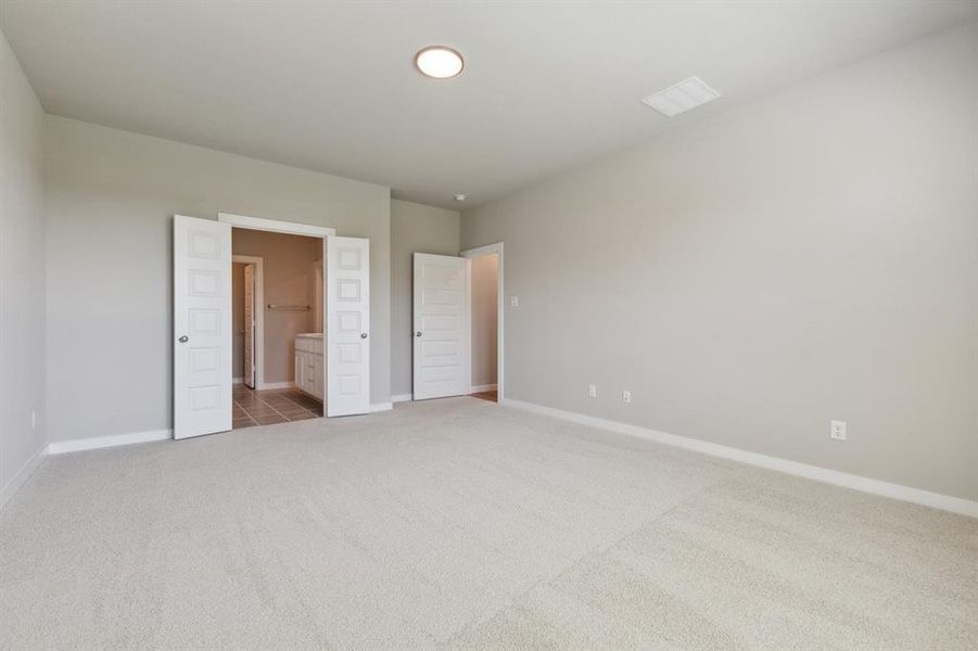 Primary suite in the Masters home plan by Trophy Signature Homes – REPRESENTATIVE PHOTO Primary suite in the Masters home plan by Trophy Signature Homes – REPRESENTATIVE PHOTO