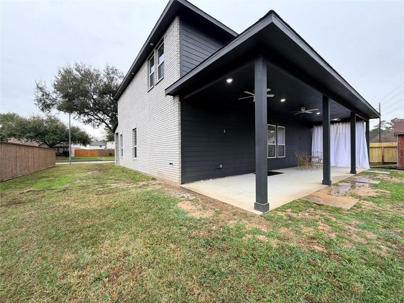 Exterior details and patio area of a home in , Houston (Image 3).