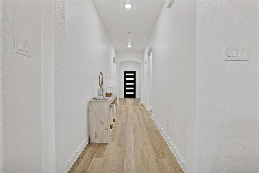 Hall featuring light hardwood / wood-style floors