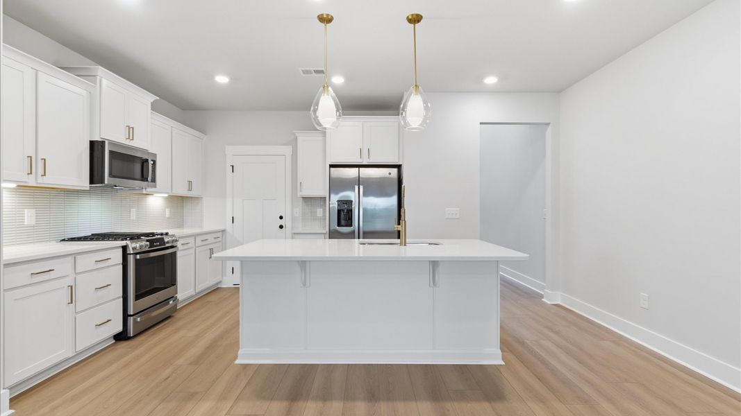 Furnished interior view inside a new home in Village at Midway, Anderson (Image 9).
