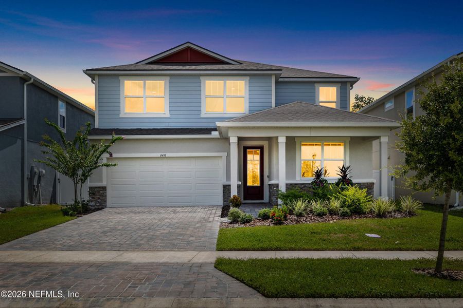 Front exterior of a new home in , Wesley Chapel, FL, highlighting curb appeal (Image 1). Front exterior of a new home in , Wesley Chapel, FL, highlighting curb appeal (Image 1).