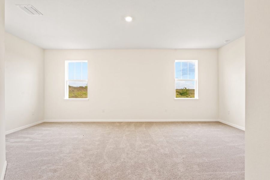 Representative unfurnished interior of a home built from the Biscayne by Holiday Builders in Eden Hills, Lake Alfred (Image 16).