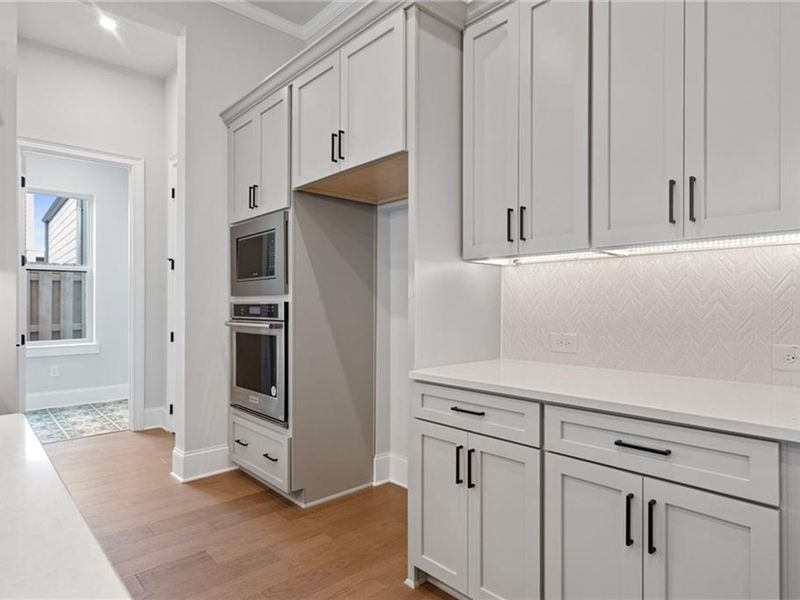 Furnished interior view inside a new home in The Village at Towne Lake, Woodstock (Image 6).