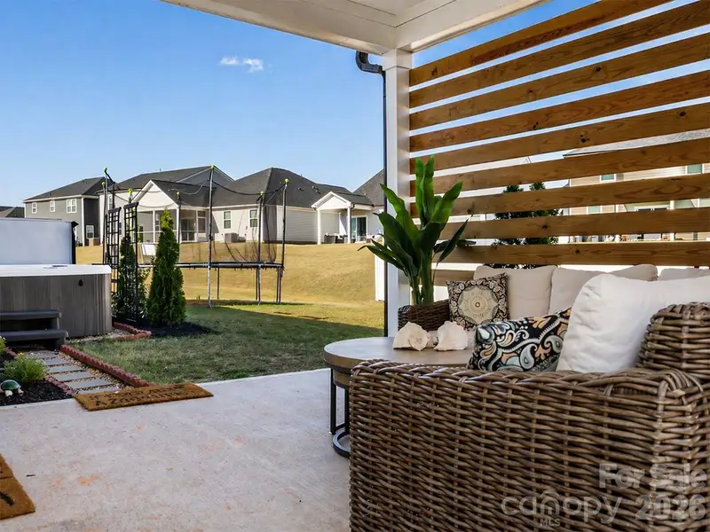 Exterior details and patio area of a home in Wilson Creek Executive Series, Indian Land (Image 23).