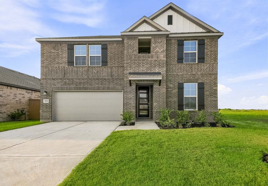 Front exterior of a new home in Sunterra Lakes, Brookshire, TX, highlighting curb appeal (Image 1). Front exterior of a new home in Sunterra Lakes, Brookshire, TX, highlighting curb appeal (Image 1).